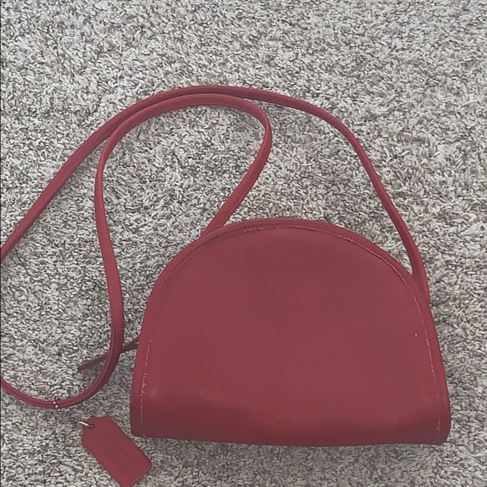 Red half moon coach purse